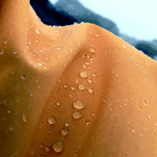 Water beading off of a ski jacket.