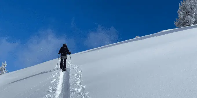 Backcountry skier walking uphill