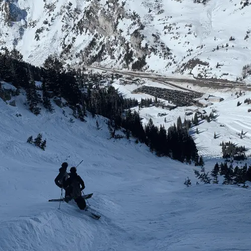 Skiers on Alta's High Rustler